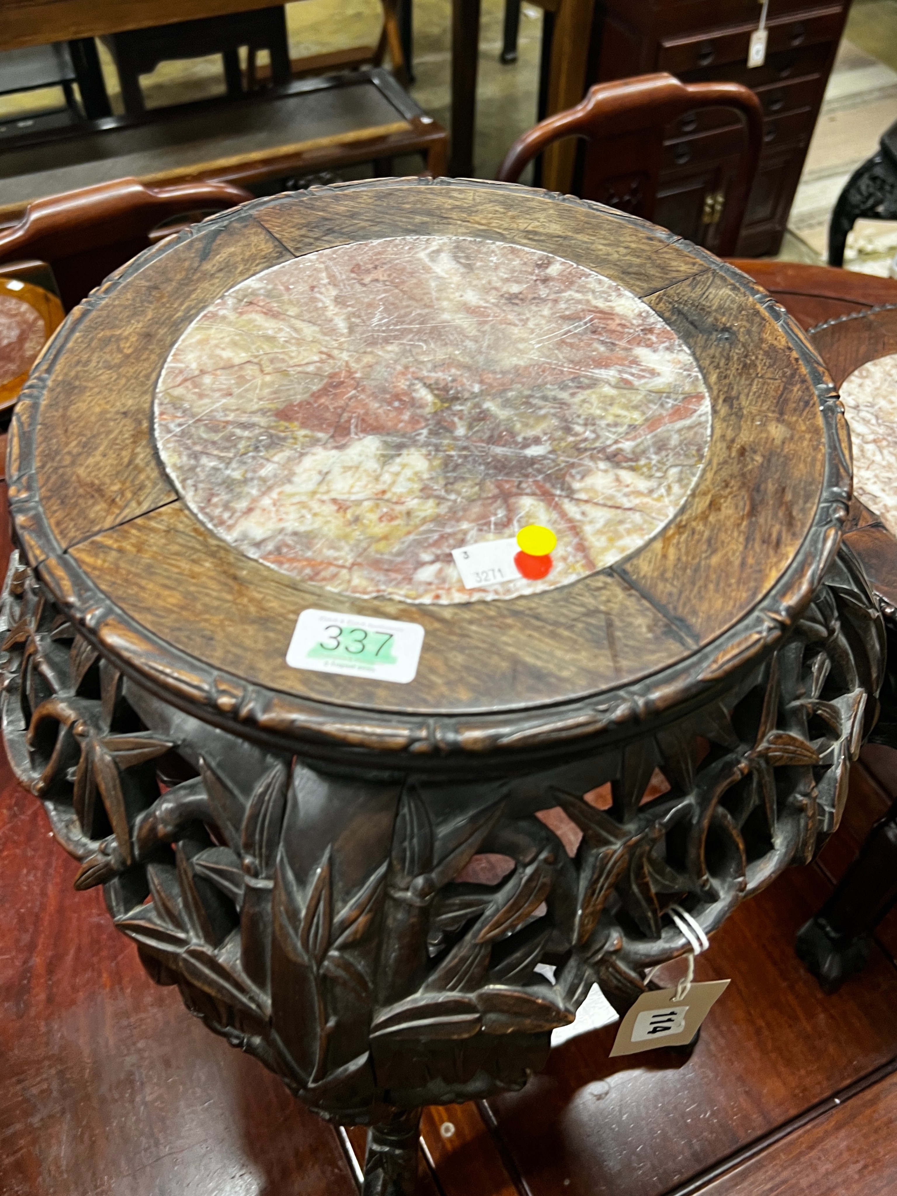 A Chinese circular marble top hongmu vase stand, width 39cm, height 62cm